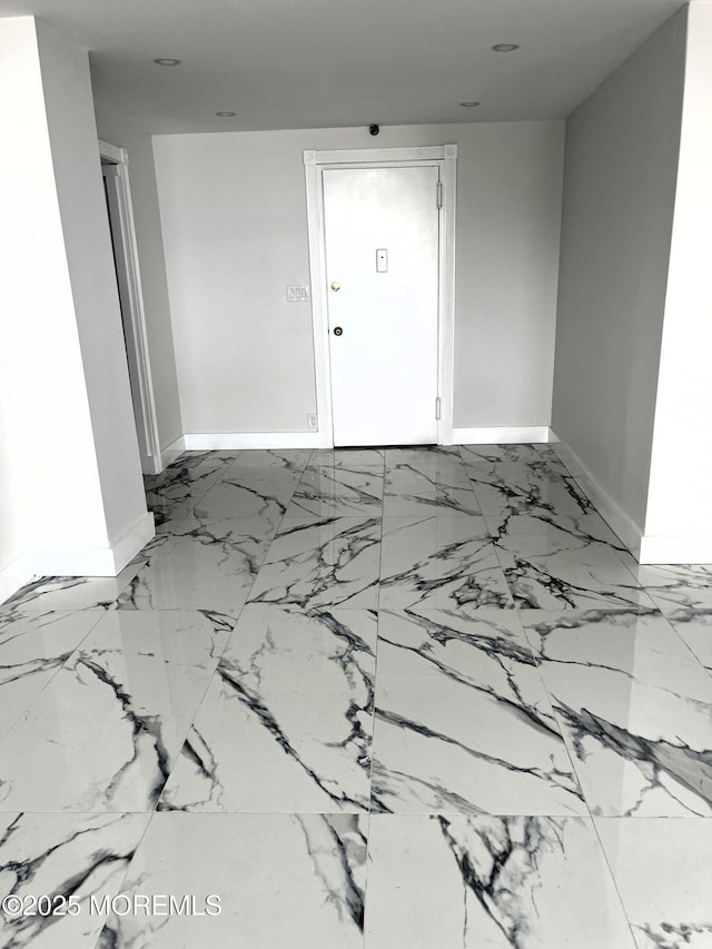 675 Ocean Ave # 9F, Long Branch, NJ 07740 - spare room with baseboards and marble finish flooring