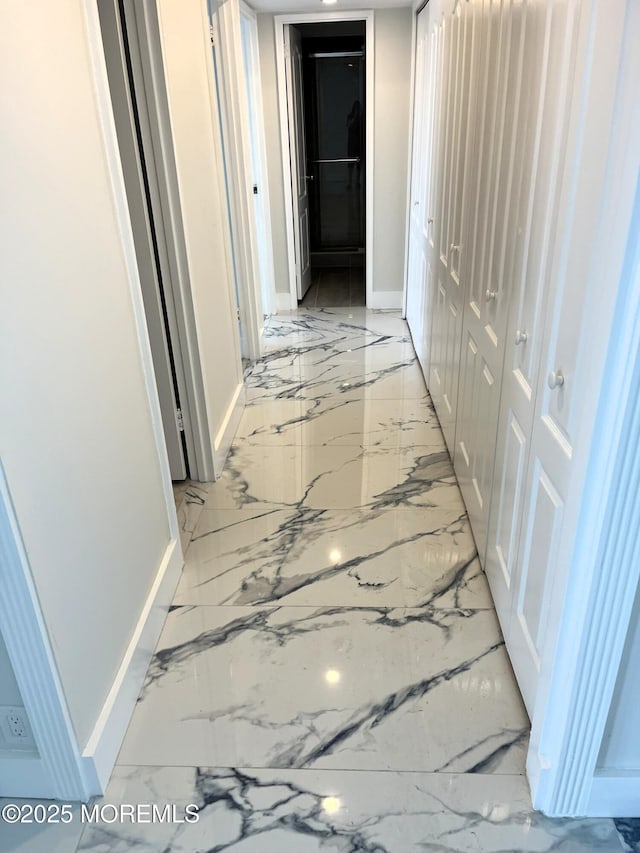 675 Ocean Ave # 9F, Long Branch, NJ 07740 - hall featuring light marble finish floors and baseboards