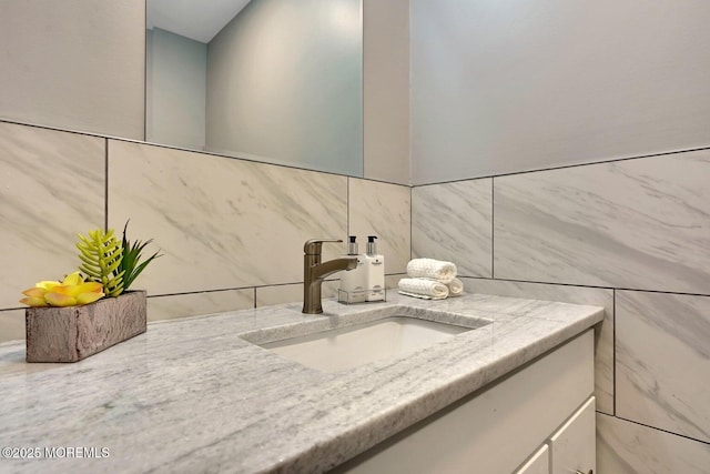 245 Brighton Ave, Long Branch, NJ 07740 - bathroom view of vanity, tile walls, and backsplash