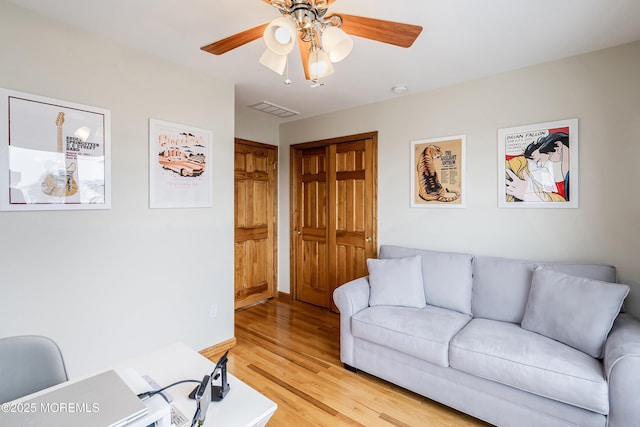 85 Channel Dr, Brick, NJ 08723 - living area featuring light wood-type flooring and ceiling fan