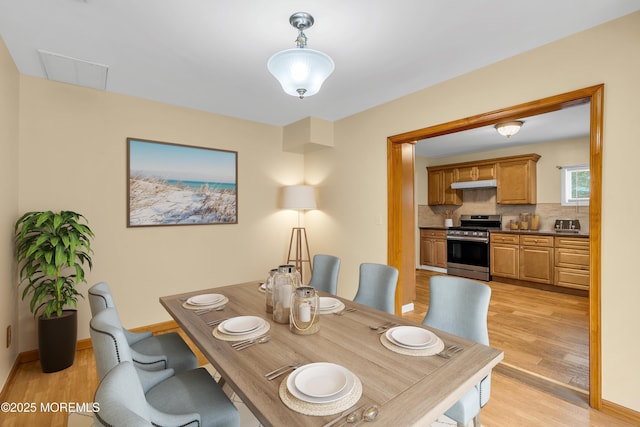 30 N Maplewood Dr, Brick, NJ 08723 - dining space featuring light wood finished floors and baseboards
