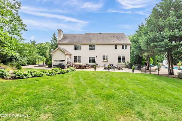 15 Conor Rd, Jackson, NJ 08527 - rear view of house featuring a patio and a chimney