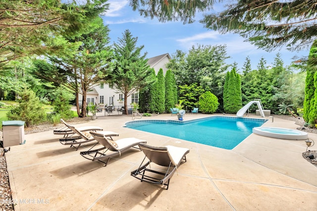 15 Conor Rd, Jackson, NJ 08527 - outdoor pool featuring a water slide and a patio area