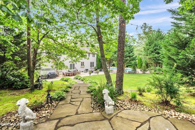 15 Conor Rd, Jackson, NJ 08527 - view of green lawn with a patio