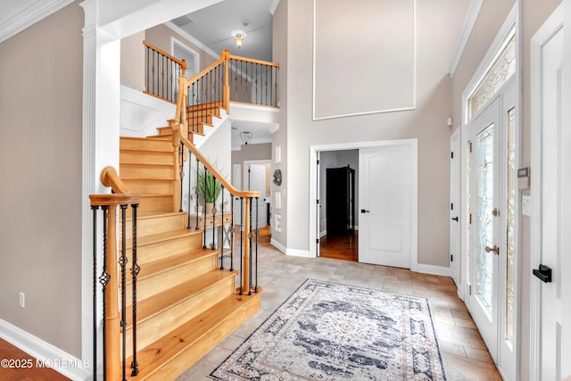 15 Conor Rd, Jackson, NJ 08527 - entryway featuring plenty of natural light, stairs, a towering ceiling, and ornamental molding