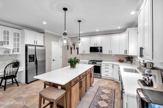 15 Conor Rd, Jackson, NJ 08527 - kitchen featuring stainless steel appliances, white cabinets, recessed lighting, decorative backsplash, and a kitchen breakfast bar