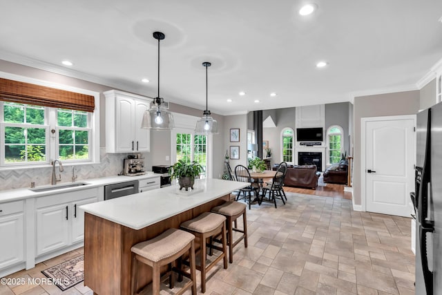 15 Conor Rd, Jackson, NJ 08527 - kitchen featuring dishwasher, decorative backsplash, recessed lighting, white cabinets, and a center island
