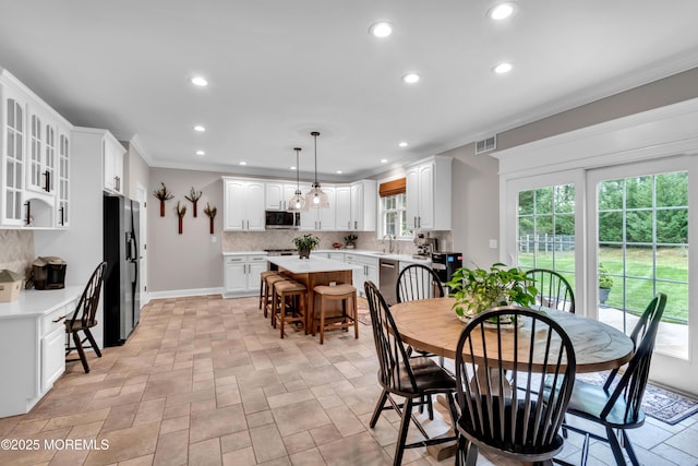 15 Conor Rd, Jackson, NJ 08527 - dining room with recessed lighting, crown molding, and light stone finish floors