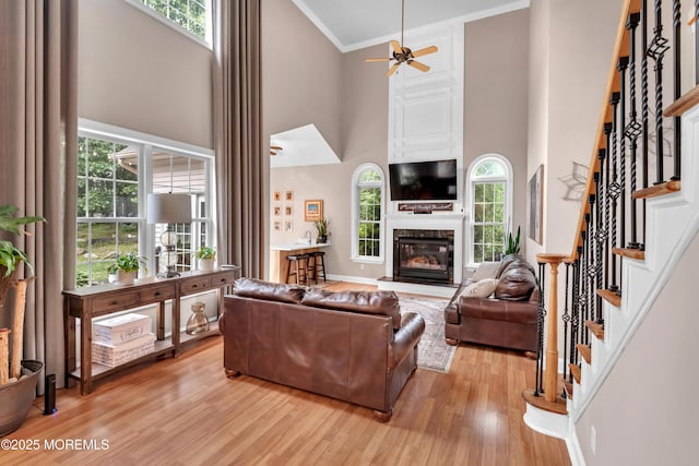 15 Conor Rd, Jackson, NJ 08527 - living area with a high ceiling, stairway, ornamental molding, light wood-type flooring, and ceiling fan