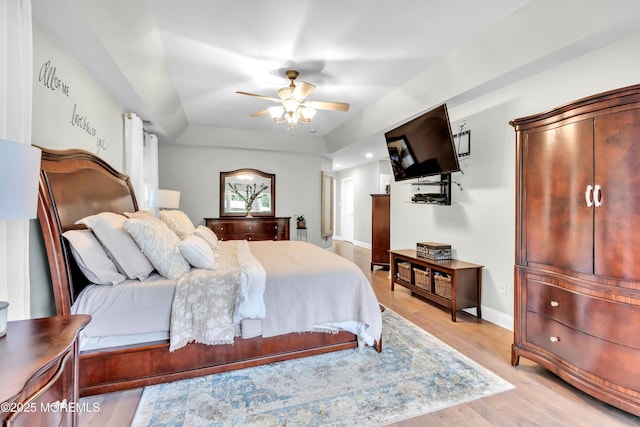 15 Conor Rd, Jackson, NJ 08527 - bedroom with light wood-style floors, a raised ceiling, and a ceiling fan
