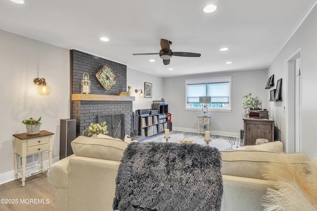 15 Liverpool Ct, Toms River, NJ 08753 - living area featuring a ceiling fan, a fireplace, recessed lighting, ornamental molding, and wood finished floors