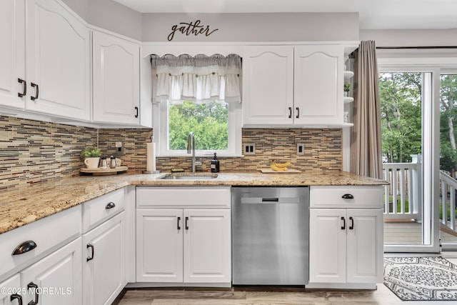 15 Liverpool Ct, Toms River, NJ 08753 - kitchen with dishwasher, light stone countertops, white cabinetry, and backsplash
