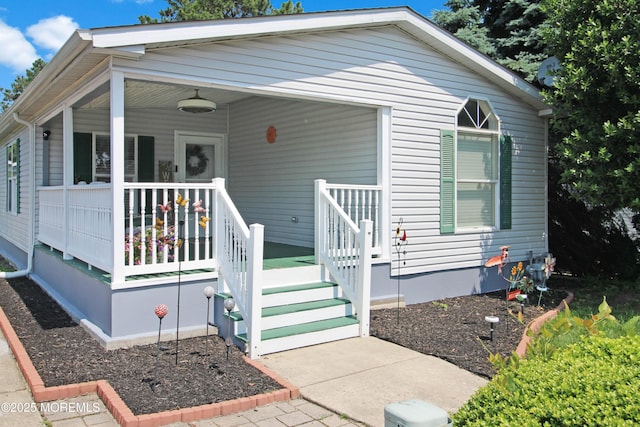26 Pine Ridge Blvd, Whiting, NJ 08759 - view of front facade with a porch
