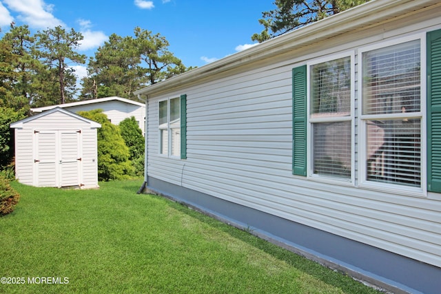 26 Pine Ridge Blvd, Whiting, NJ 08759 - view of side of home with a shed and a yard