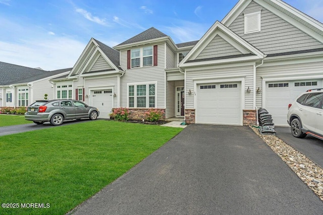 73 Aqueduct Blvd, New Egypt, NJ 08533 - view of property featuring driveway, a front lawn, and stone siding