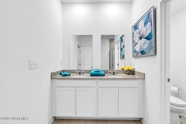 73 Aqueduct Blvd, New Egypt, NJ 08533 - bathroom with double vanity and a shower stall