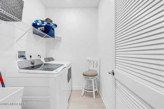 73 Aqueduct Blvd, New Egypt, NJ 08533 - laundry room featuring separate washer and dryer and light wood-style flooring