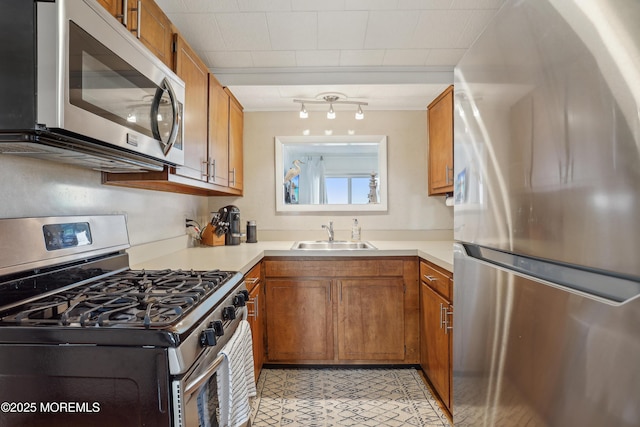 398 Kingfisher Rd, Tuckerton, NJ 08087 - kitchen featuring stainless steel appliances, brown cabinets, and light countertops