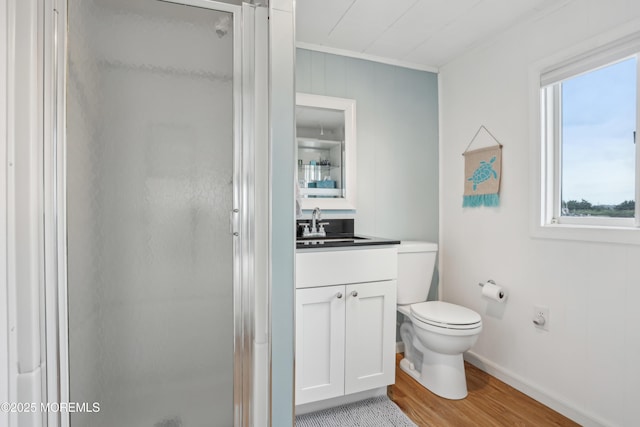 398 Kingfisher Rd, Tuckerton, NJ 08087 - full bathroom with a shower stall, wood finished floors, vanity, healthy amount of natural light, and ornamental molding