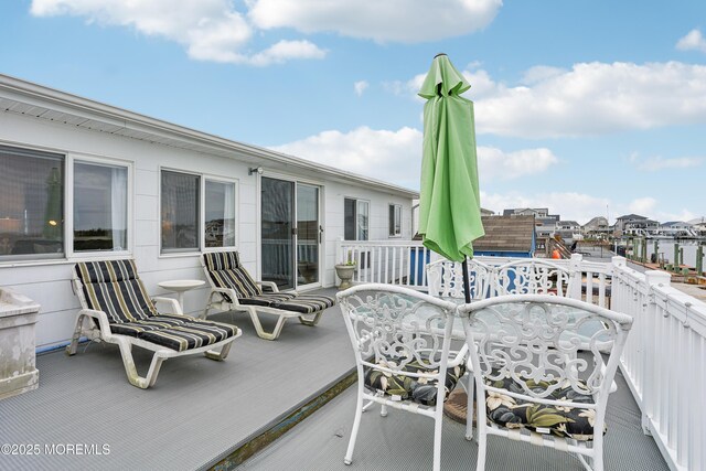 398 Kingfisher Rd, Tuckerton, NJ 08087 - view of wooden balcony with a deck