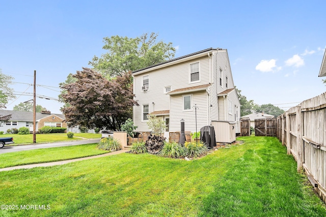 124 Mckinnon St, Piscataway Twp, NJ 08854 - back of house with a fenced backyard