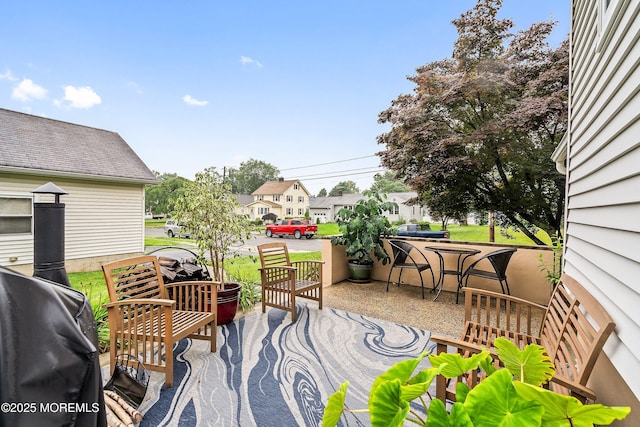 124 Mckinnon St, Piscataway Twp, NJ 08854 - view of patio featuring a residential view and a grill