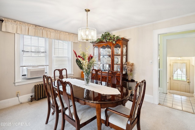 124 Mckinnon St, Piscataway Twp, NJ 08854 - dining area with light carpet, a chandelier, plenty of natural light, cooling unit, and ornamental molding