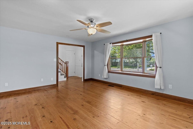 367 Marine St, Tuckerton, NJ 08087 - unfurnished room with hardwood / wood-style flooring, a ceiling fan, and stairway