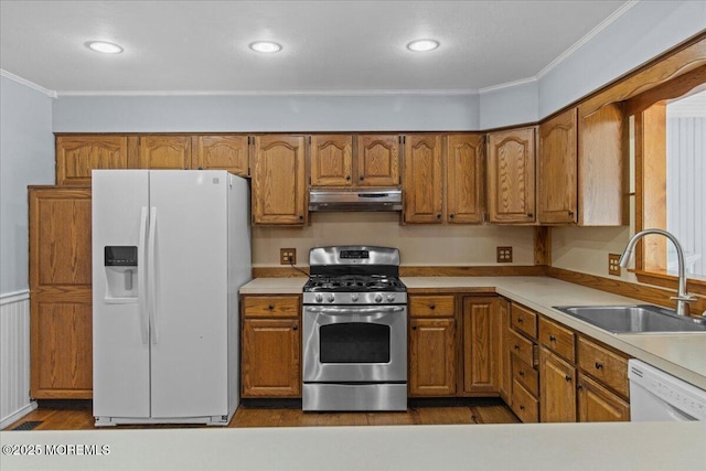 367 Marine St, Tuckerton, NJ 08087 - kitchen featuring white appliances, under cabinet range hood, ornamental molding, brown cabinets, and recessed lighting