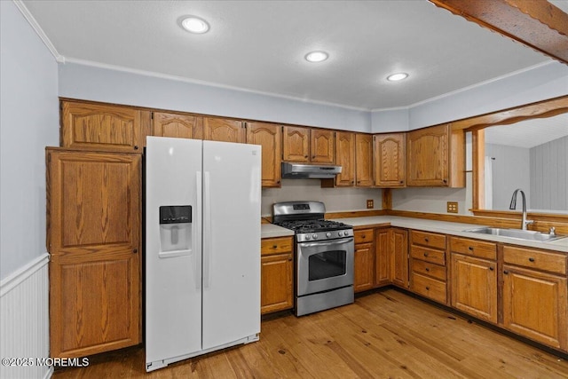 367 Marine St, Tuckerton, NJ 08087 - kitchen featuring white fridge with ice dispenser, gas stove, under cabinet range hood, brown cabinets, and recessed lighting
