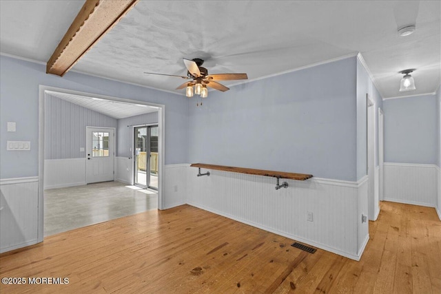 367 Marine St, Tuckerton, NJ 08087 - unfurnished room with hardwood / wood-style floors, a wainscoted wall, ceiling fan, and ornamental molding