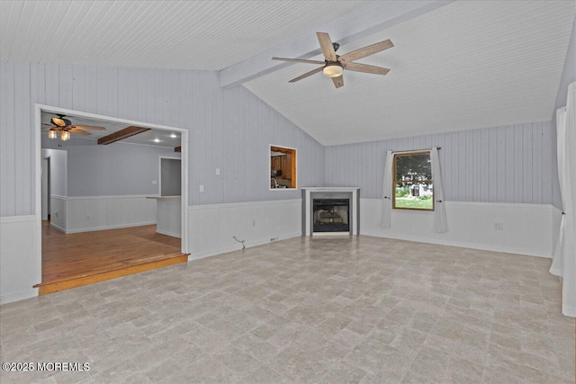 367 Marine St, Tuckerton, NJ 08087 - unfurnished living room featuring ceiling fan, a fireplace, a wainscoted wall, and tile patterned floors