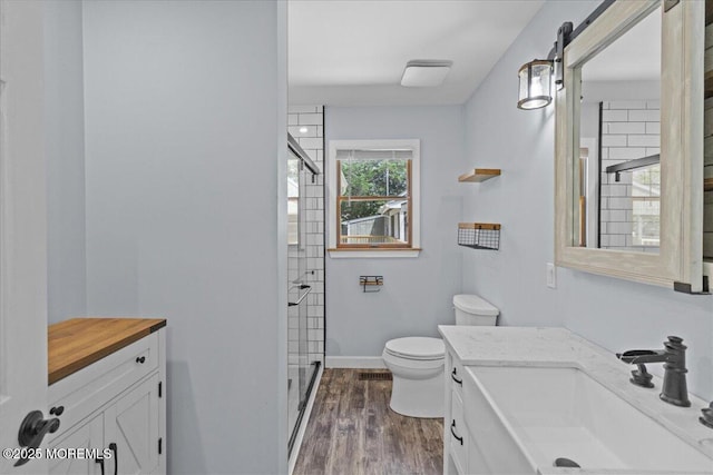 367 Marine St, Tuckerton, NJ 08087 - full bathroom with a stall shower, vanity, and wood finished floors