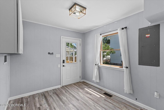 367 Marine St, Tuckerton, NJ 08087 - entryway with electric panel, wood finished floors, and crown molding