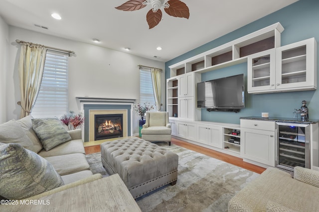 130 Masters Dr, Monroe, NJ 08831 - living room featuring wine cooler, a ceiling fan, healthy amount of natural light, light wood-style floors, and recessed lighting