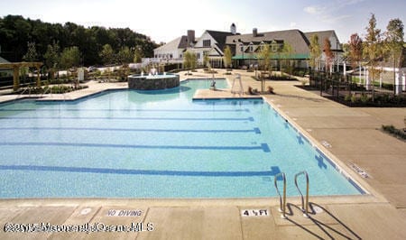 130 Masters Dr, Monroe, NJ 08831 - community pool featuring a patio area