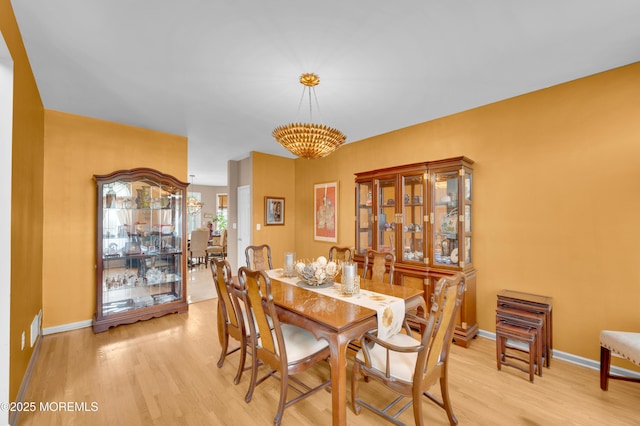 47 Lori St, Monroe, NJ 08831 - dining room featuring light wood finished floors and a chandelier