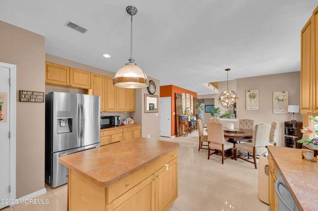 47 Lori St, Monroe, NJ 08831 - kitchen featuring appliances with stainless steel finishes, light brown cabinets, recessed lighting, pendant lighting, and light countertops