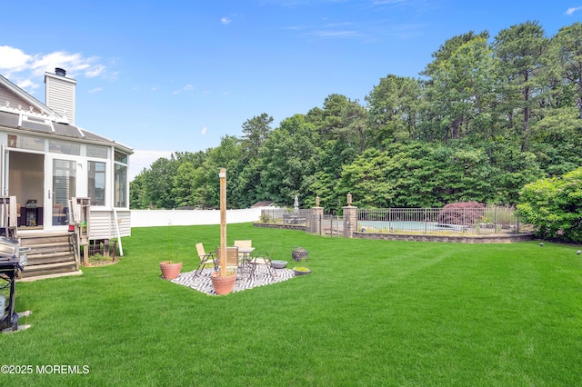 47 Lori St, Monroe, NJ 08831 - view of yard with a sunroom and a patio