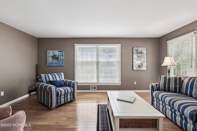 404 5th Ave, Spring Lake, NJ 07762 - living area featuring healthy amount of natural light and wood finished floors