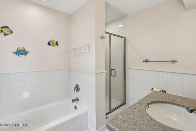 404 5th Ave, Spring Lake, NJ 07762 - bathroom featuring a bath, a shower stall, a wainscoted wall, and vanity