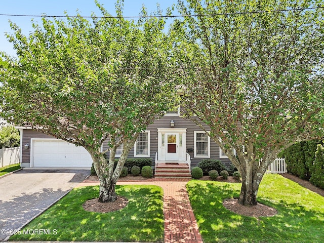 404 5th Ave, Spring Lake, NJ 07762 - view of property hidden behind natural elements with concrete driveway
