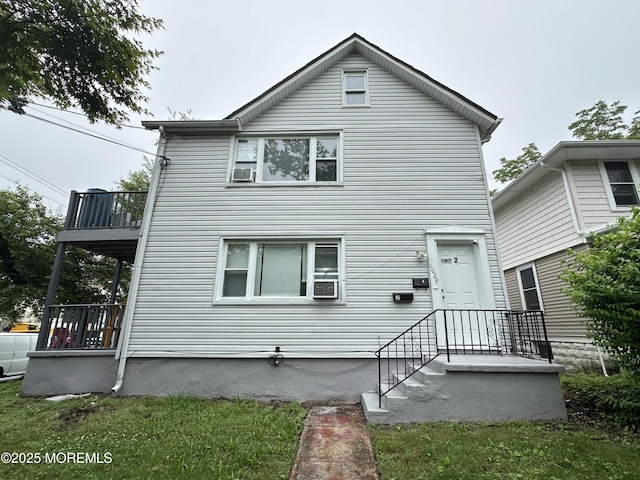 1029 1st Ave, Asbury Park, NJ 07712 - rear view of property with a balcony and cooling unit