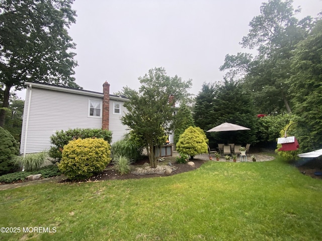 3 Maria Ct, Brick, NJ 08724 - view of grassy yard featuring a patio