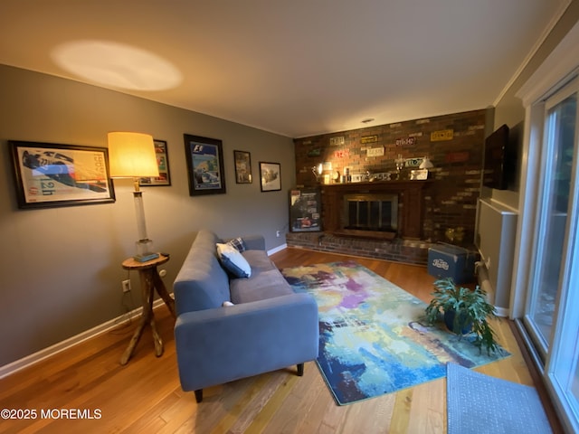 3 Maria Ct, Brick, NJ 08724 - living area with wood finished floors and a brick fireplace