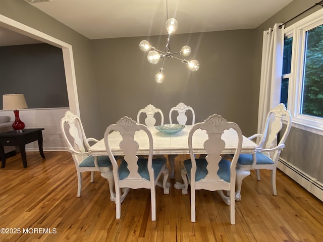 3 Maria Ct, Brick, NJ 08724 - dining room featuring a chandelier, light wood finished floors, and a baseboard radiator