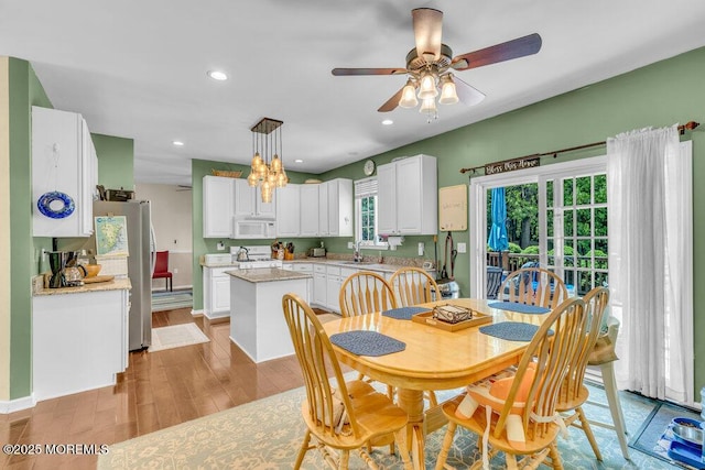 41 Hampshire Blvd, Jackson, NJ 08527 - dining room with light wood-style flooring, a ceiling fan, recessed lighting, and a chandelier