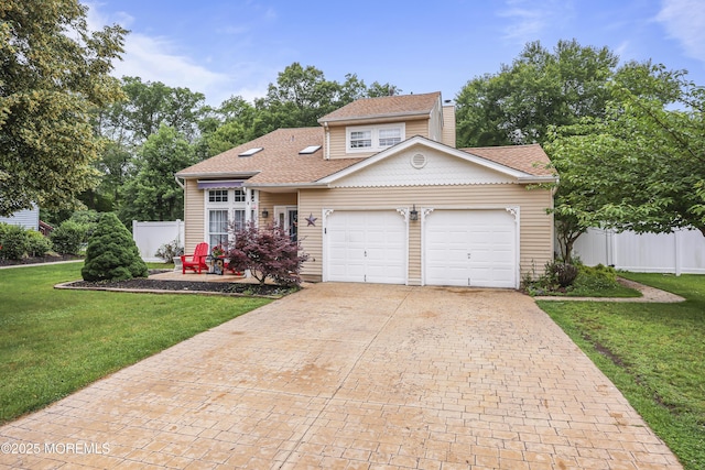 39 Sweet Gum Rd, Howell, NJ 07731 - view of front facade with a garage, decorative driveway, a shingled roof, and a chimney
