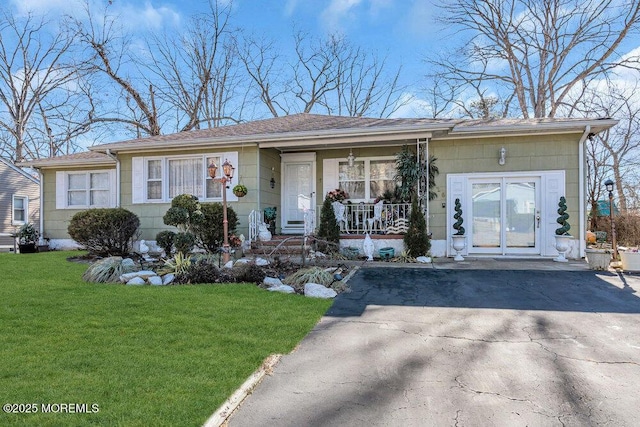 426 Shady Ln, Howell, NJ 07731 - view of front of home with a porch and a front lawn