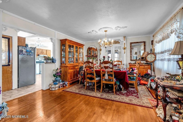 426 Shady Ln, Howell, NJ 07731 - dining area featuring a chandelier, hardwood / wood-style floors, and crown molding